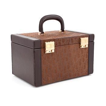 467. CHRISTIAN DIOR, a brown leather monogrammed beautybox from the 1970s.