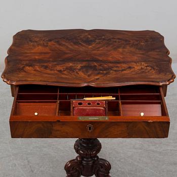 A Neo-Rococo 19th century sewing table.