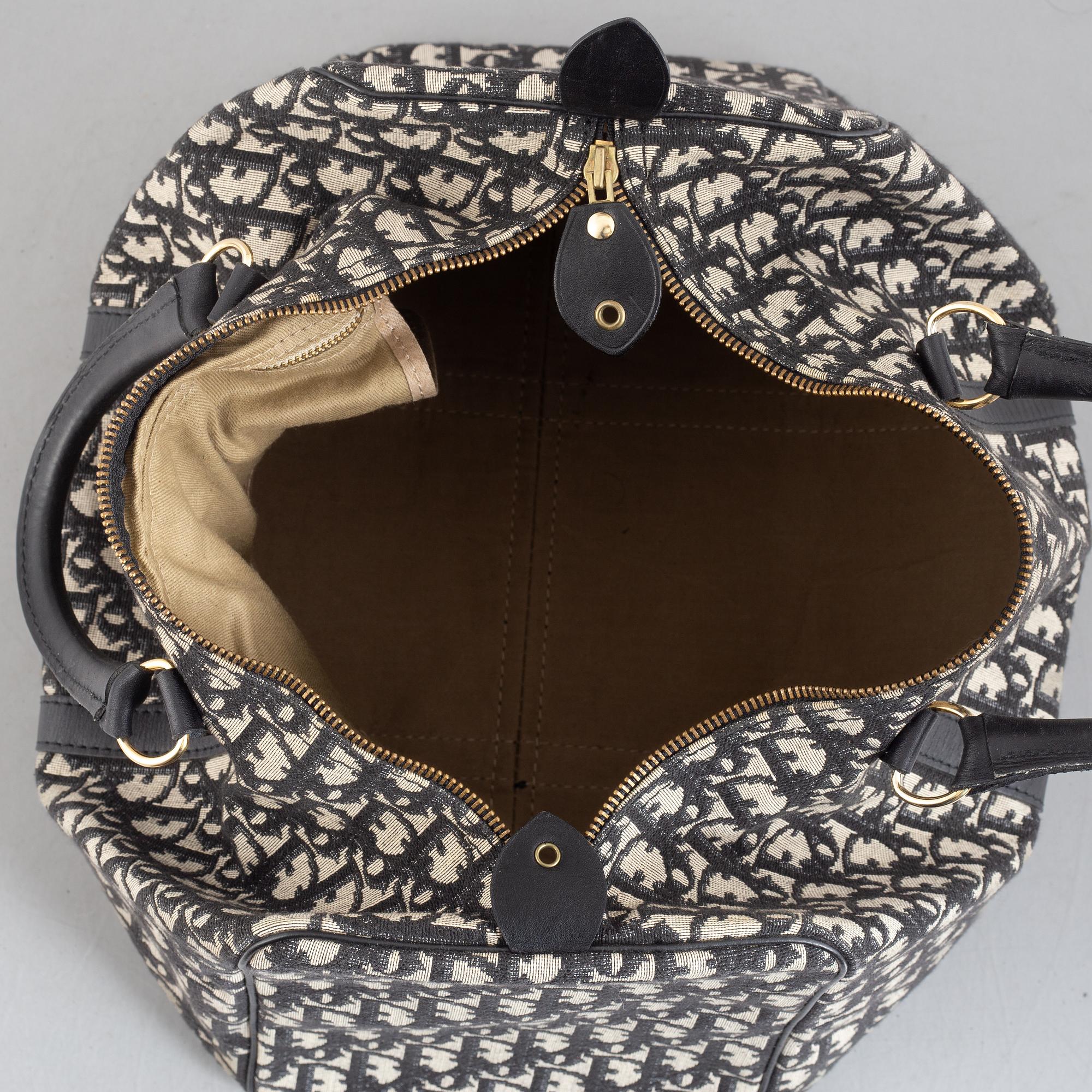 Christian Dior, a weekend bag.