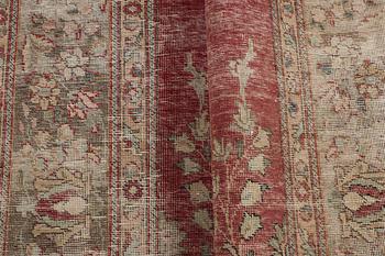 An oriental vintage design carpet, c. 335 x 240 cm.