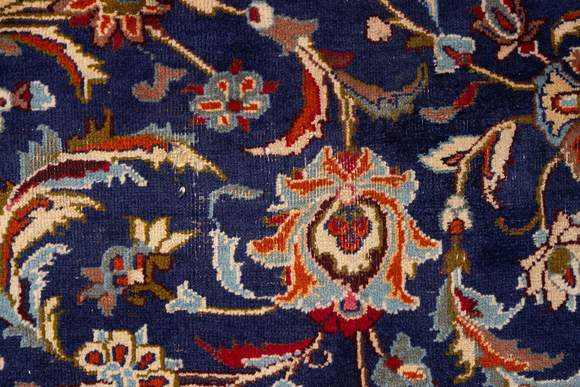 An oriental carpet, c. 390 x 295 cm.