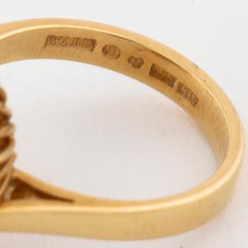 A amber and brilliant cut diamond ring by Walters guldsmedja, Stockholm, 1991.