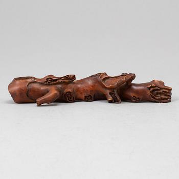 634. A boxwood brush rest, Qing dynasty, 19th Century.