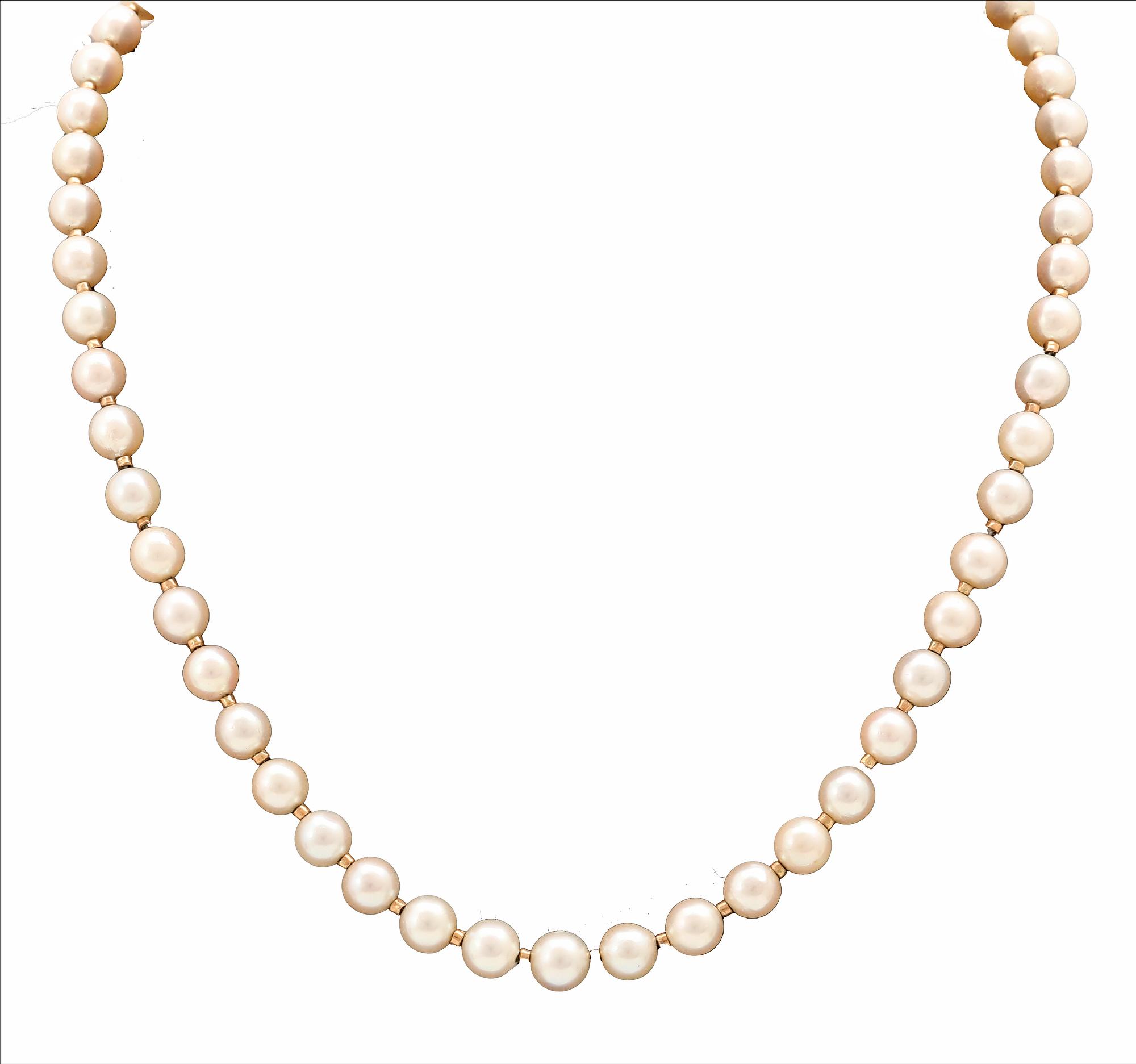 A necklace of cultured pearls, clasp of 18K gold, cabochon cut aquamarine and seed pearls, Atelier Ajour Stockholm 1963.