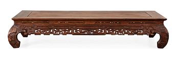 1680. A wooden Chinese low table, 20th Century.