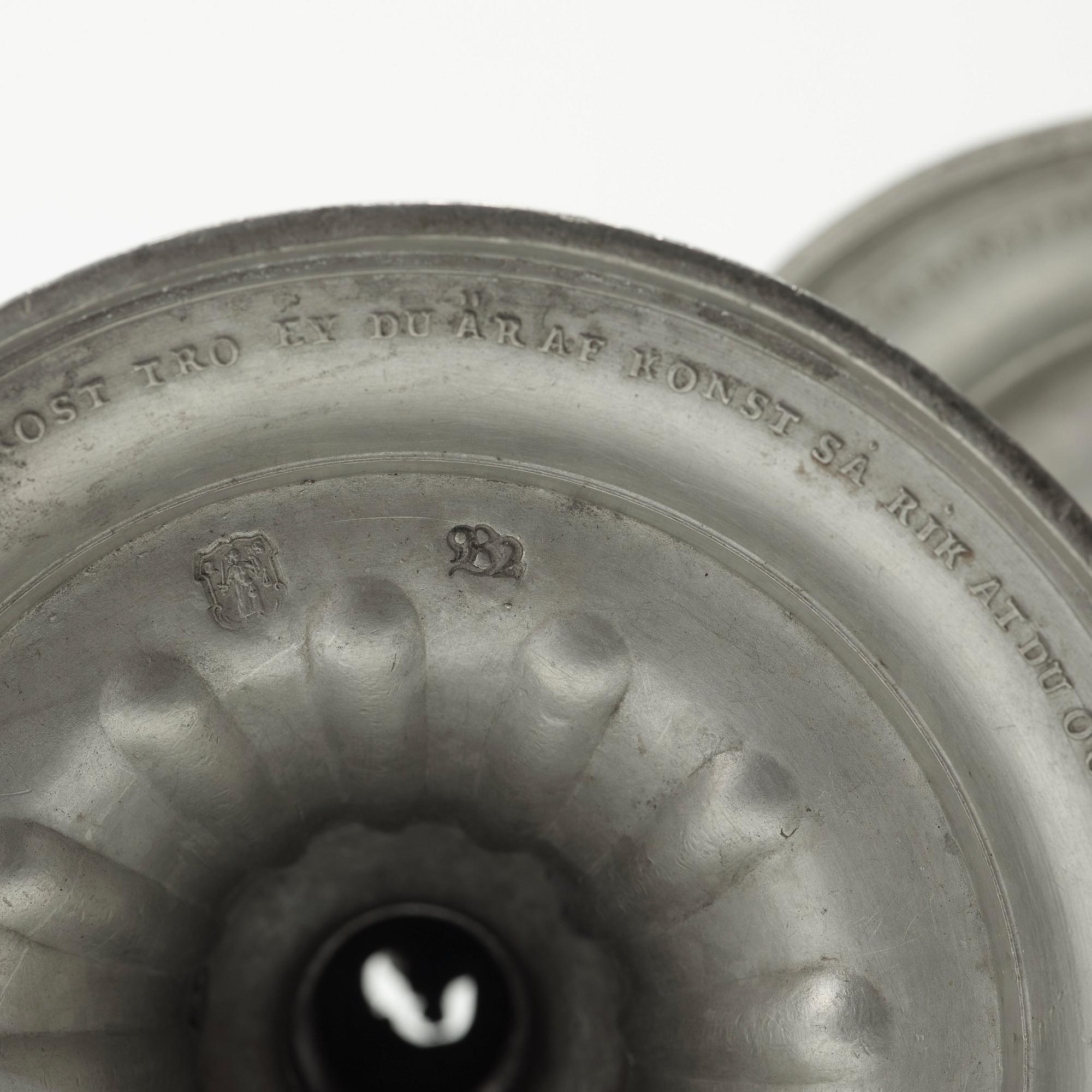 A pair of Gustavian pewter candlesticks by Jacob Sauer, Stockholm 1784.