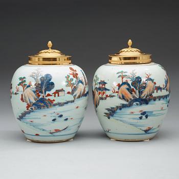 A pair of imari jars with gilt bronze covers. Qing dynasty, early 18th Century.