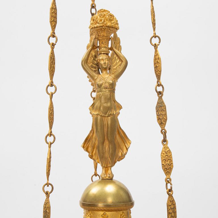 A presumably Italian Empire six-light ormolu chandelier, early 19th century.