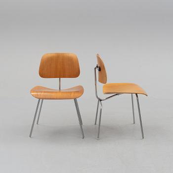 CHARLES & RAY EAMES, a pair of DCM chairs from Herman  Miller.