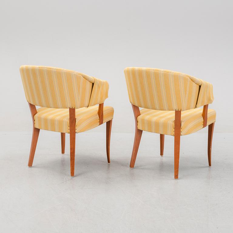 Carl Malmsten, a pair of 'Lata Greven' easy chairs, OH Sjögren, and a 'Berg' table, second half of the 20th Century.