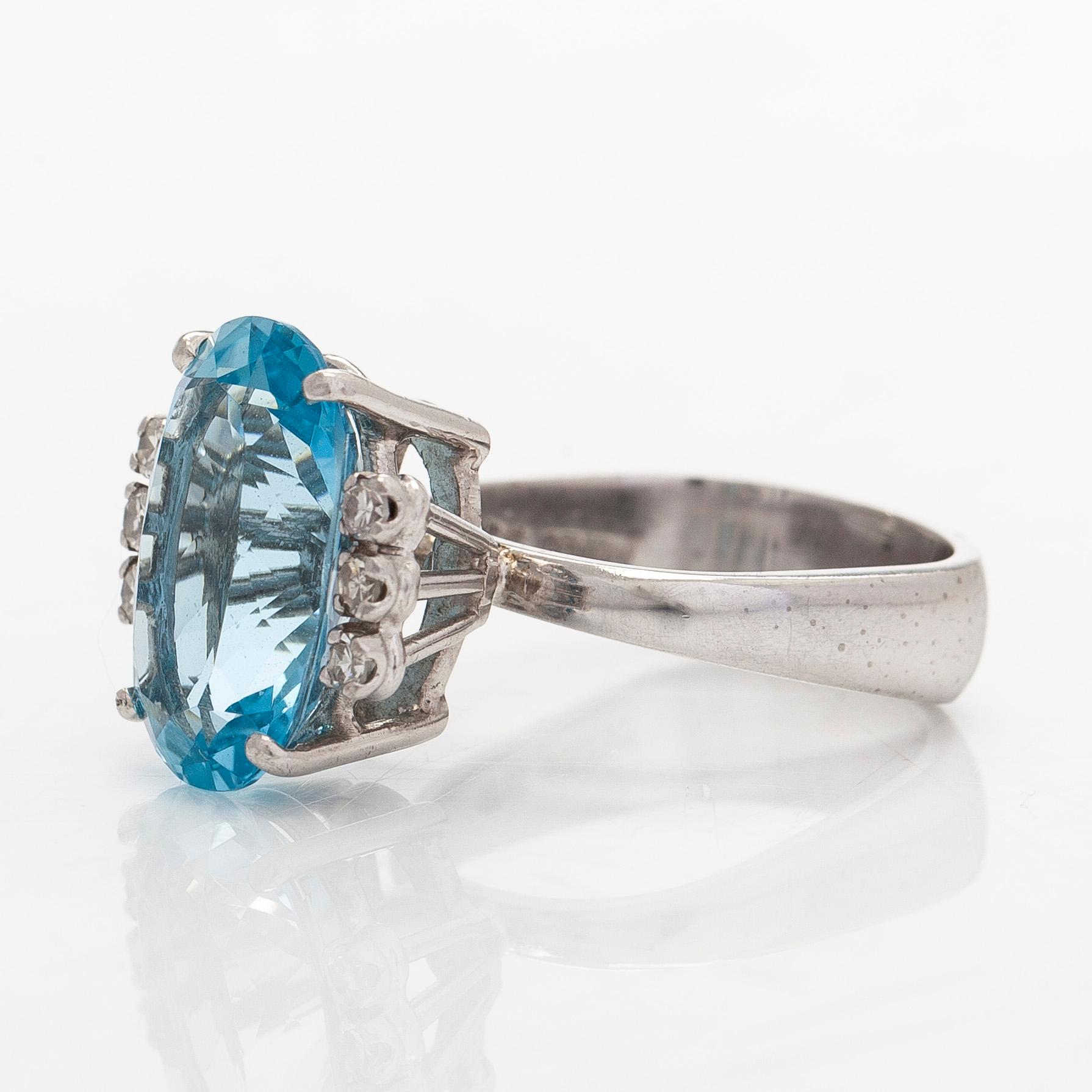 An 18K white gold ring with aquamarine and brilliant-cut diamonds, Conti, South Africa.