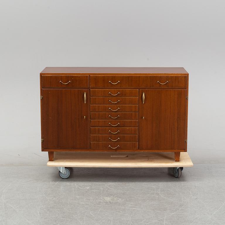 A mahogany veneered sideboard, mid 20th century.