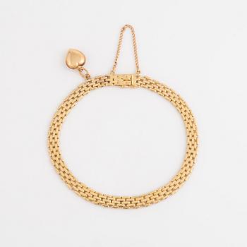 18K gold bracelet.