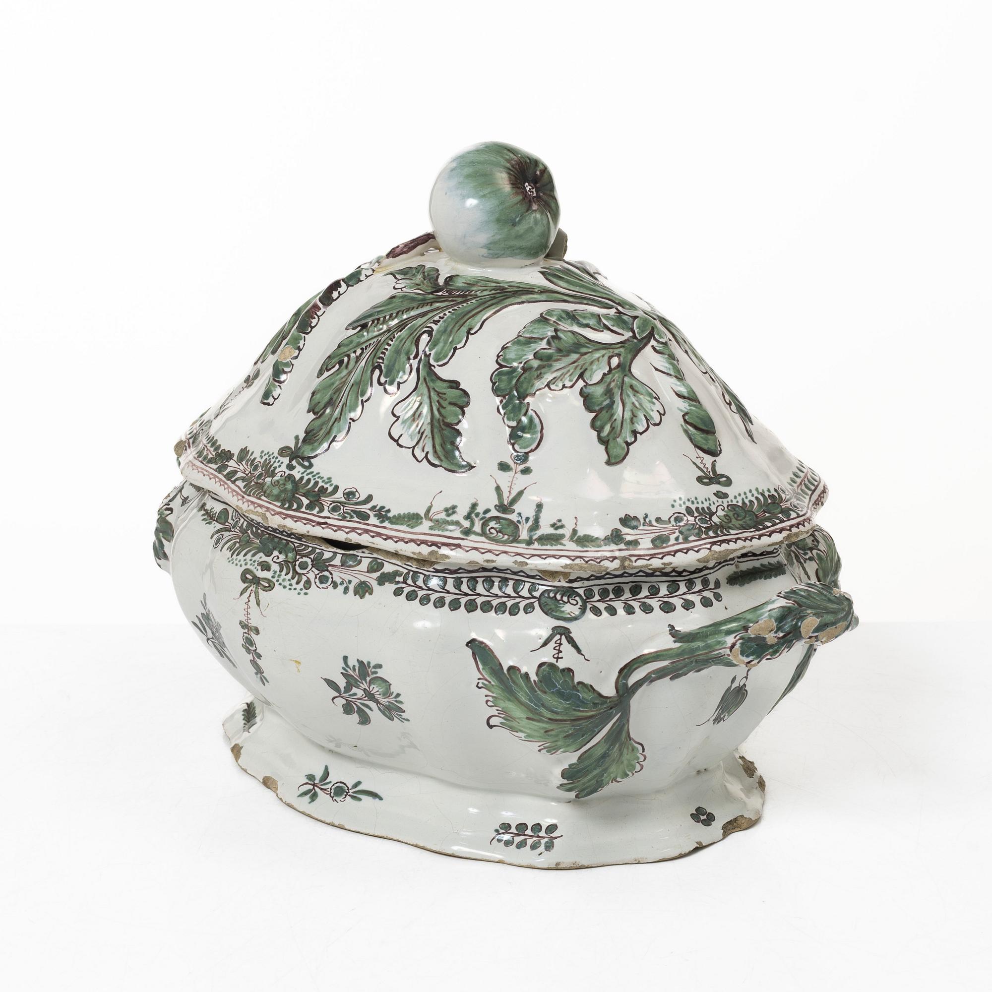 A faience lidded turrine, France, 18th/19th century.