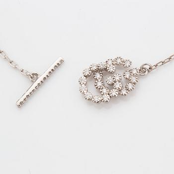 Gucci bracelet set with brilliant-cut diamonds.