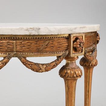 A Gustavian giltwood and marble console table, late 18th century.