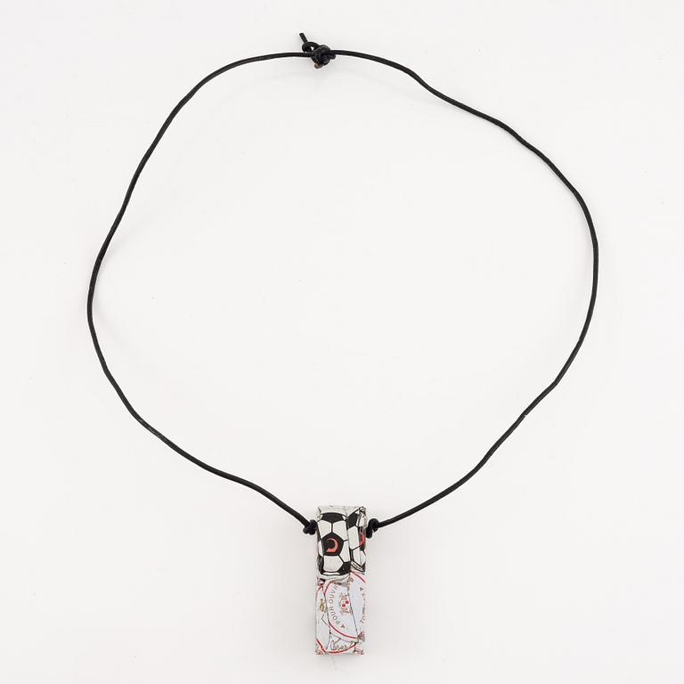 César Baldaccini, compression, pendant made of compressed beer bottle caps.