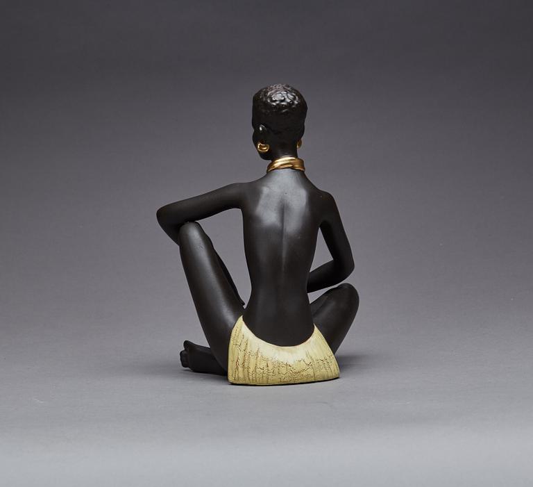 FIGURIN, etikettmärkt Goldscheider.