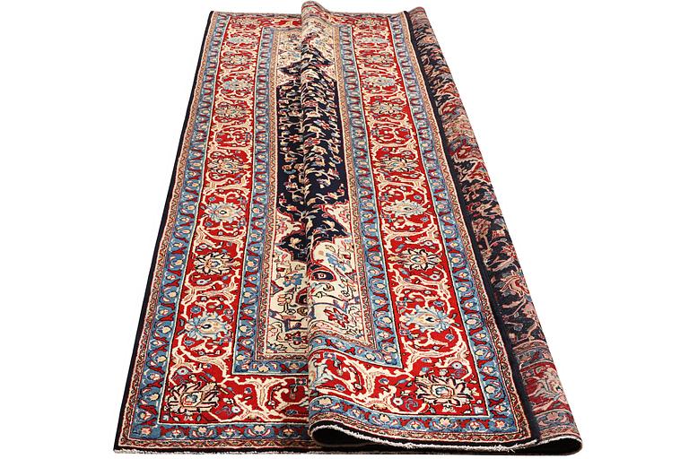 A carpet, Mashad, c. 386 x 259 cm.