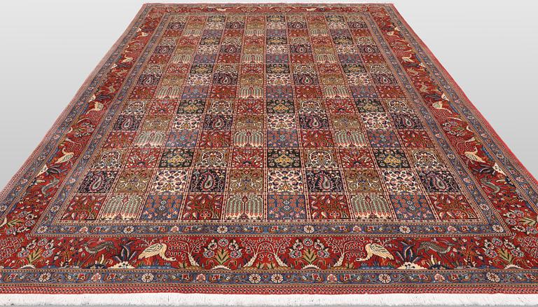 A Moud part silk carpet, 354 x 252 cm.