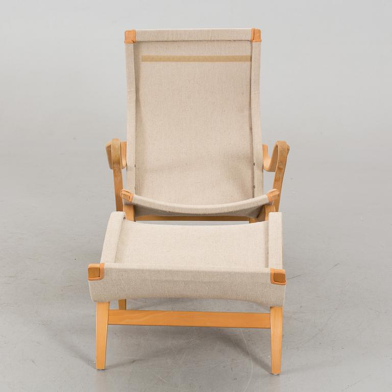 BRUNO MATHSSON, "PERNILLA" ARMCHAIR WITH STOOL.