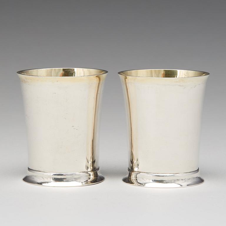 A pair of Swedish Empire parcel-gilt beakers, mark of Lorenz Georg Weis, Norrkoping 1814.