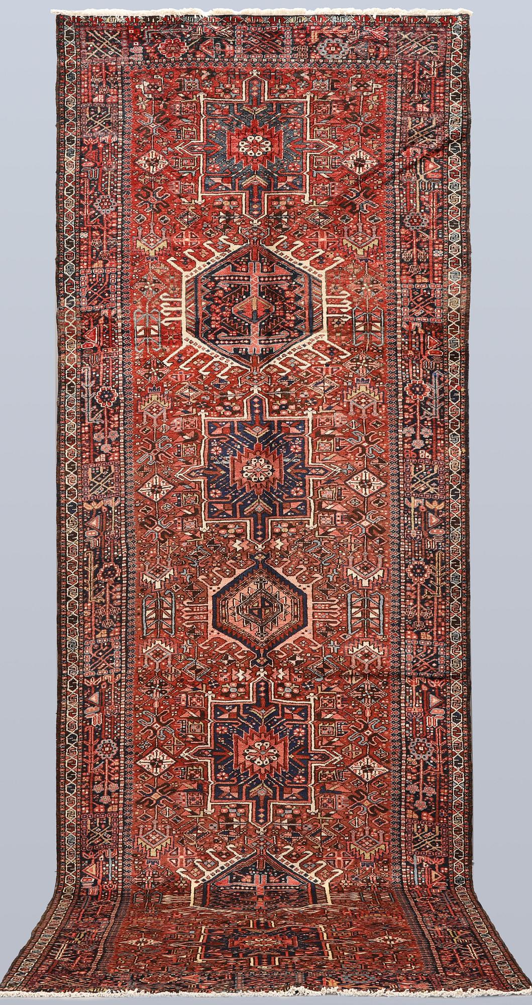 A semi-antique Garadje runner, approx. 425 x 148 cm.