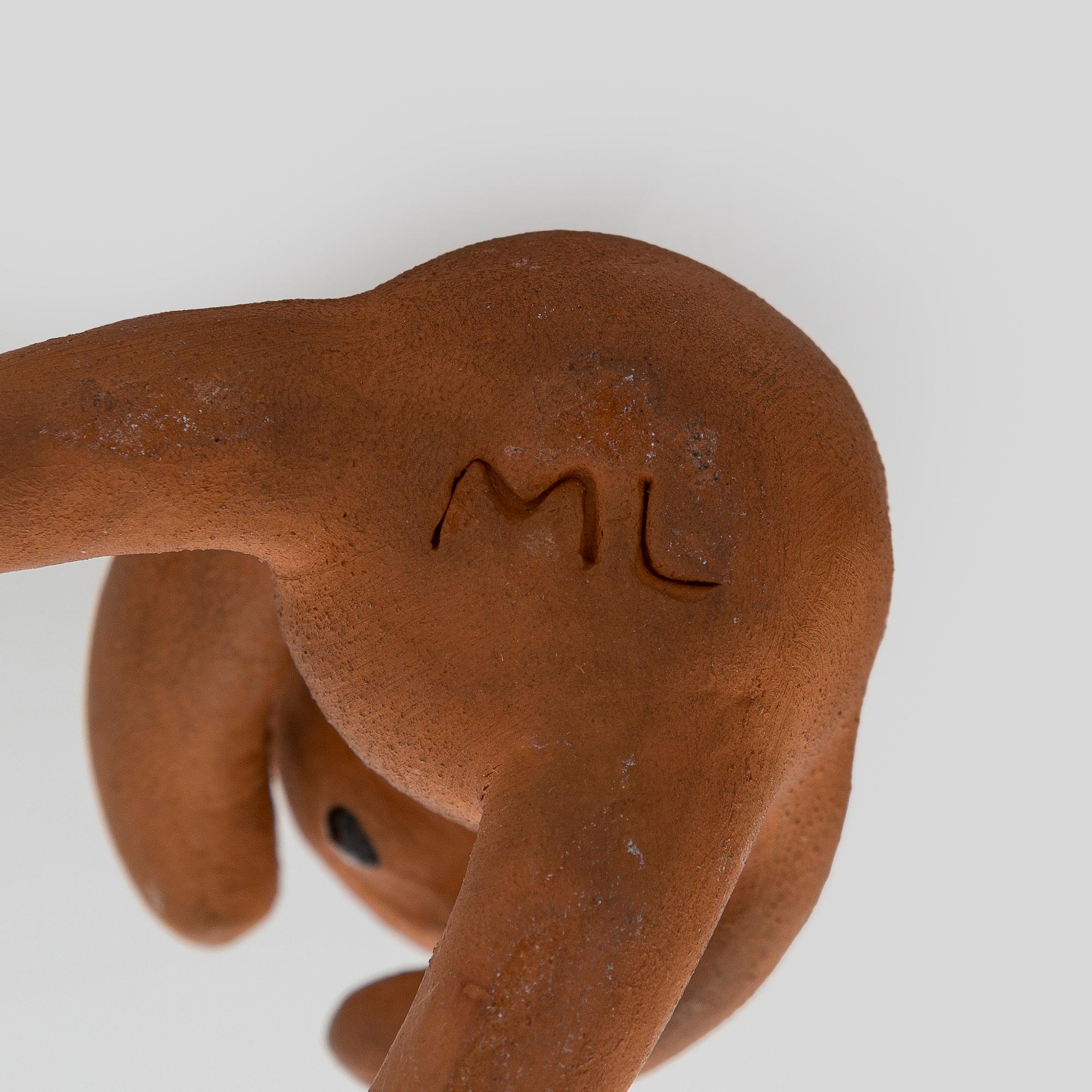 Marita Lybeck, Two red clay figurines, signed ML.
