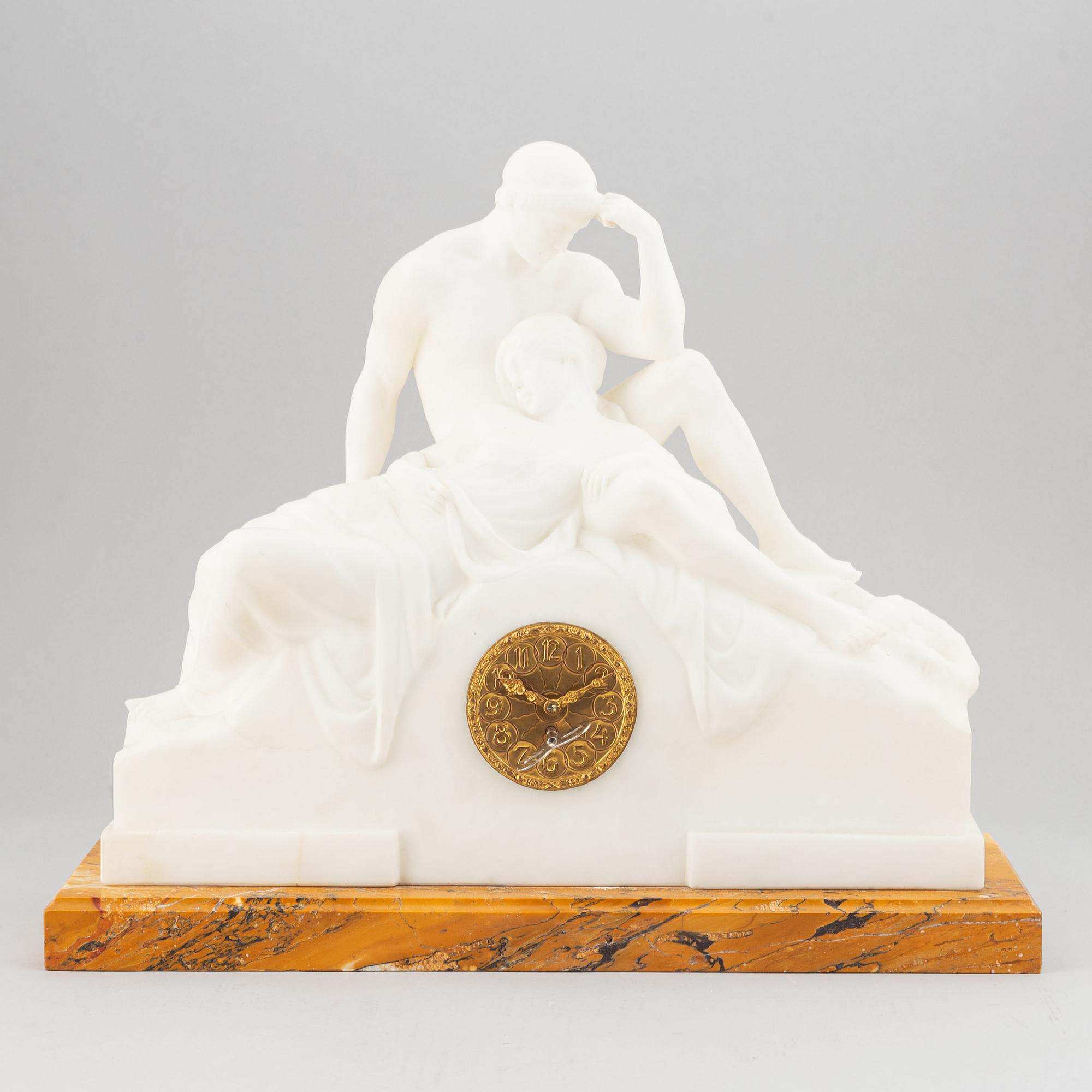 An alabaster mantle clock from the second half of the 19th-century.