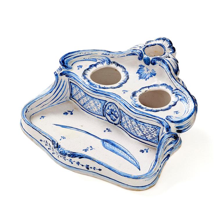 A Swedish unmarked Rörstrand rococo faience desk set, 18th century.