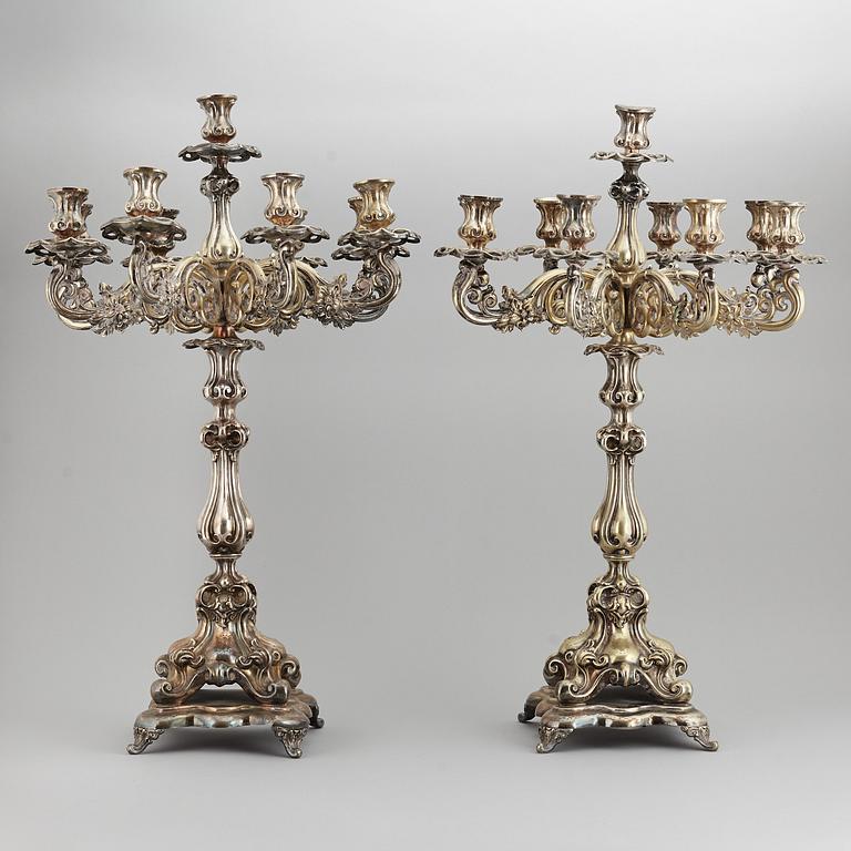 A pair of barocque style nine lights candelabra, silver plate, 20th Century.
