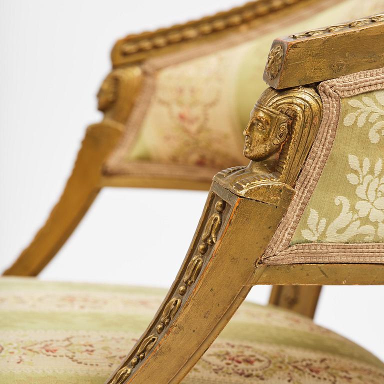 A pair of late Gustavian open armchairs attributed to E. Ståhl (master in Stockholm 1794-1820).