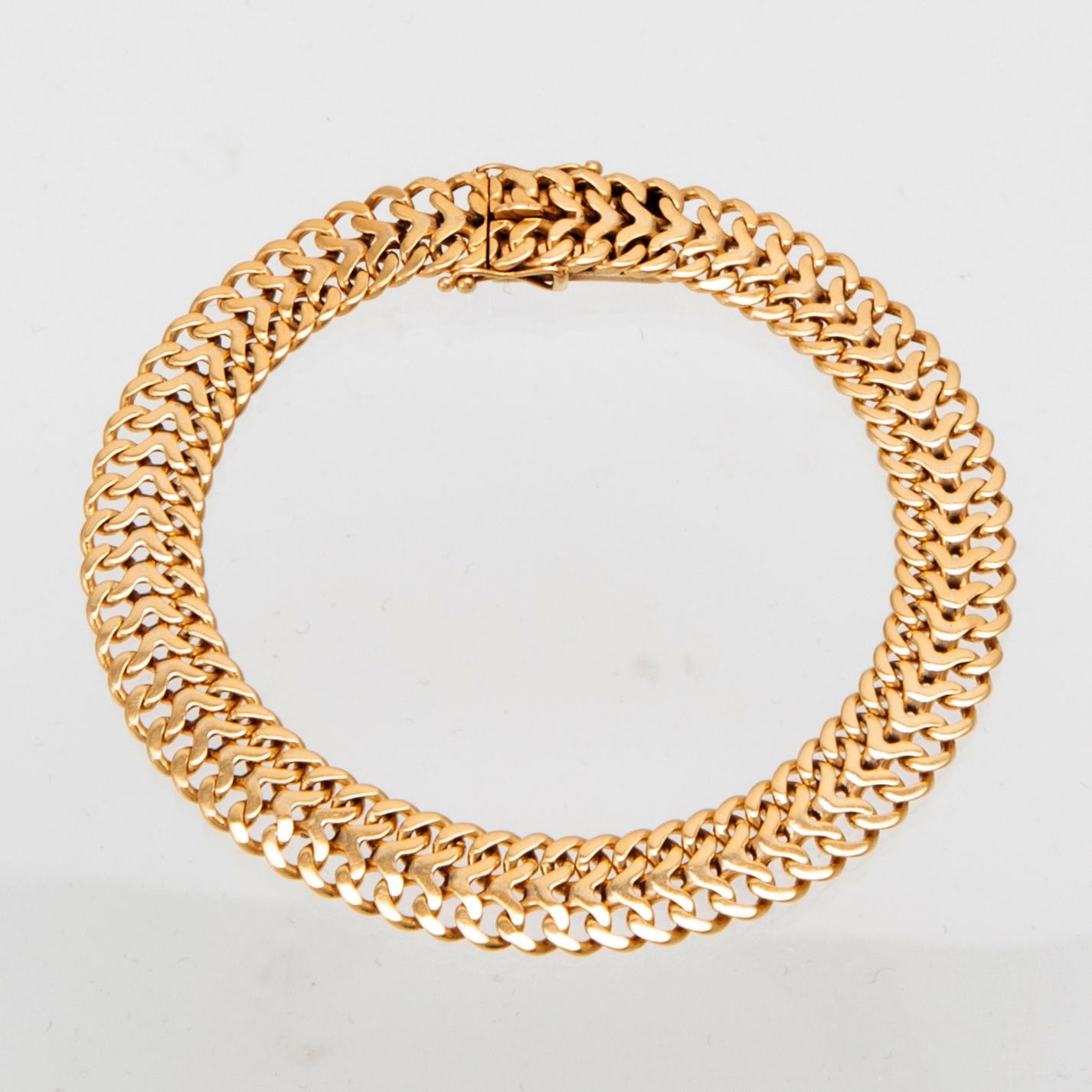 Armband 18K guld fiskbenslänk.