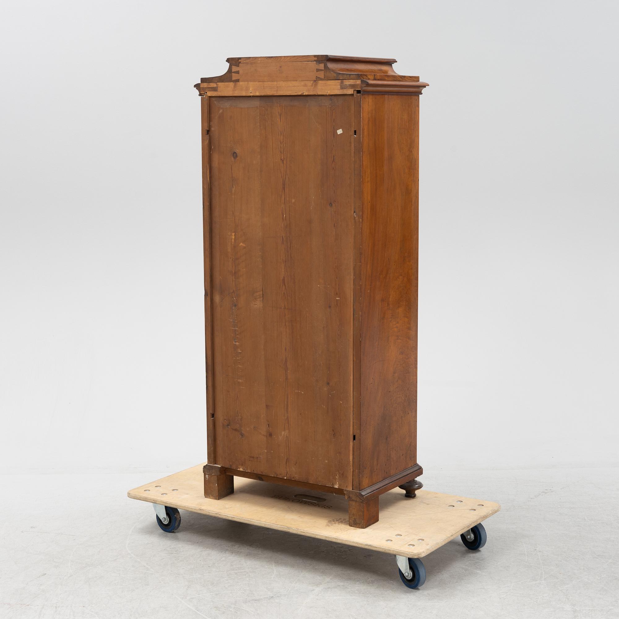A walnut veneered cabinet, second half of the 19th Century.