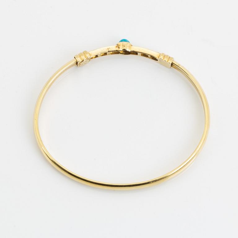 14K gold, turquoise and white stones.