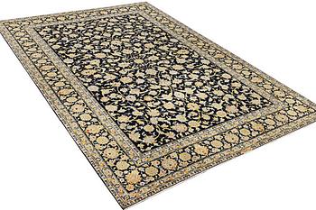 A Kashan carpet, c. 363 x 247 cm.