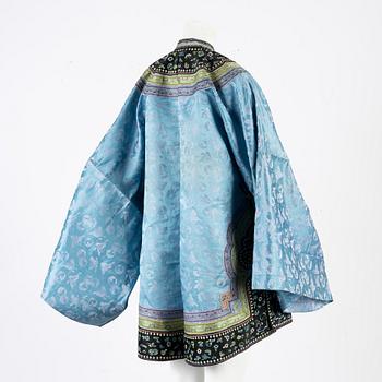 A Chinese silk robe, early 20th Century.