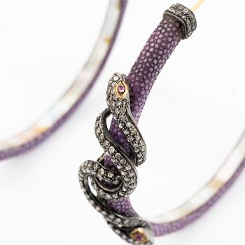 A pair of earrings in the shape of a snake, leather, mother-of-pearl and silver, with  diamonds in various cuts.