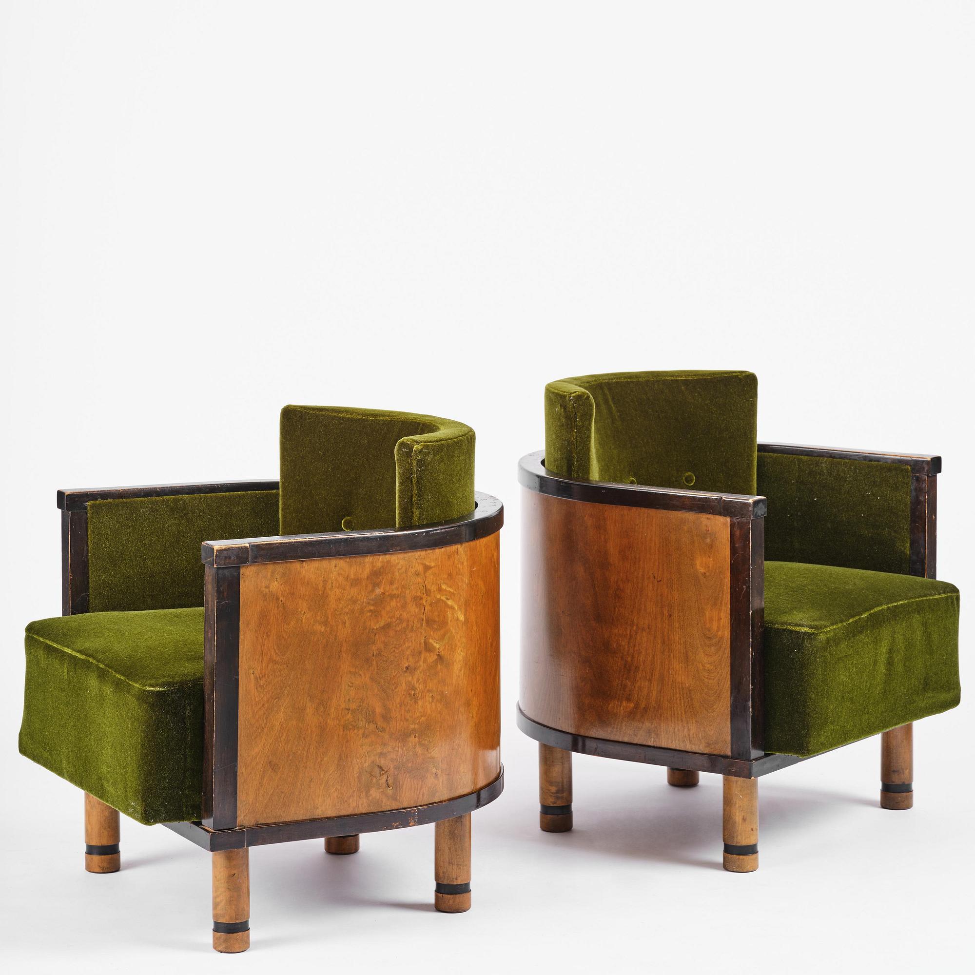 A pair of 1930s birch armchairs.