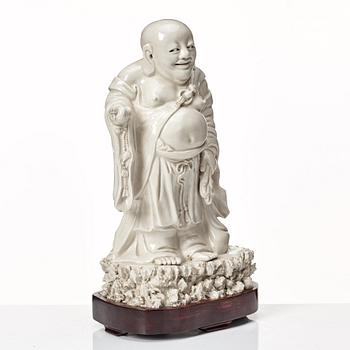 A blanc de chine figure of Buddai, Qing dynasty.