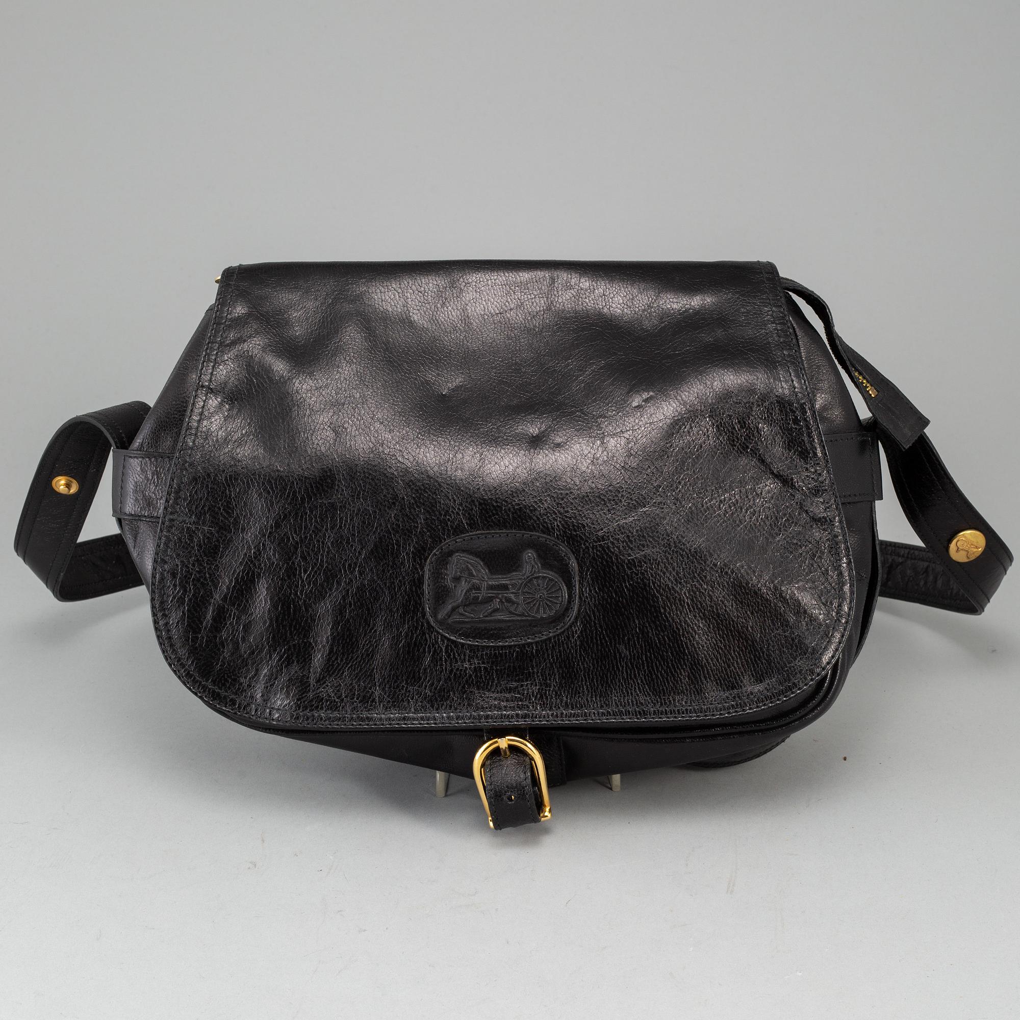 CÉLINE,a black leather handbag.