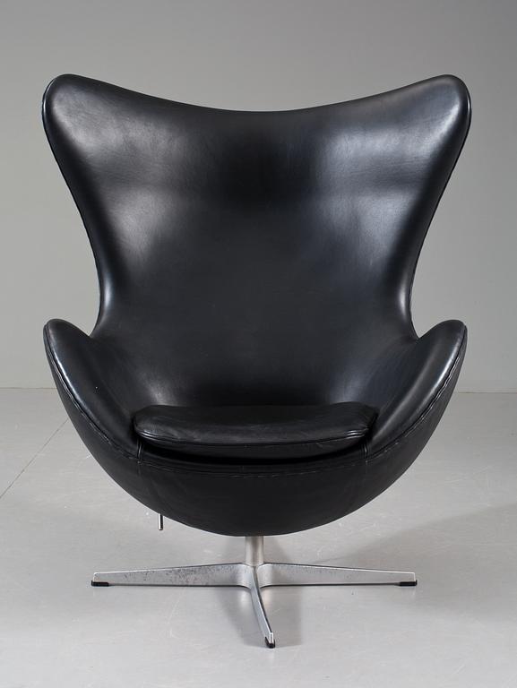 An Arne Jacobsen black leather and steel 'Egg Chair', Fritz Hansen, Denmark 2001.