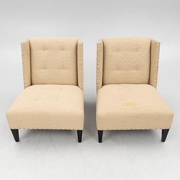 A pair of 'Triton custom chair' lounge chairs, Andrew & Martin, England, 21st century.