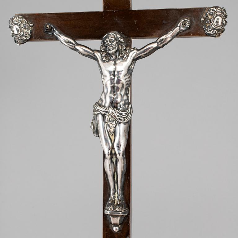 An 18th century silver and wood crucifix.