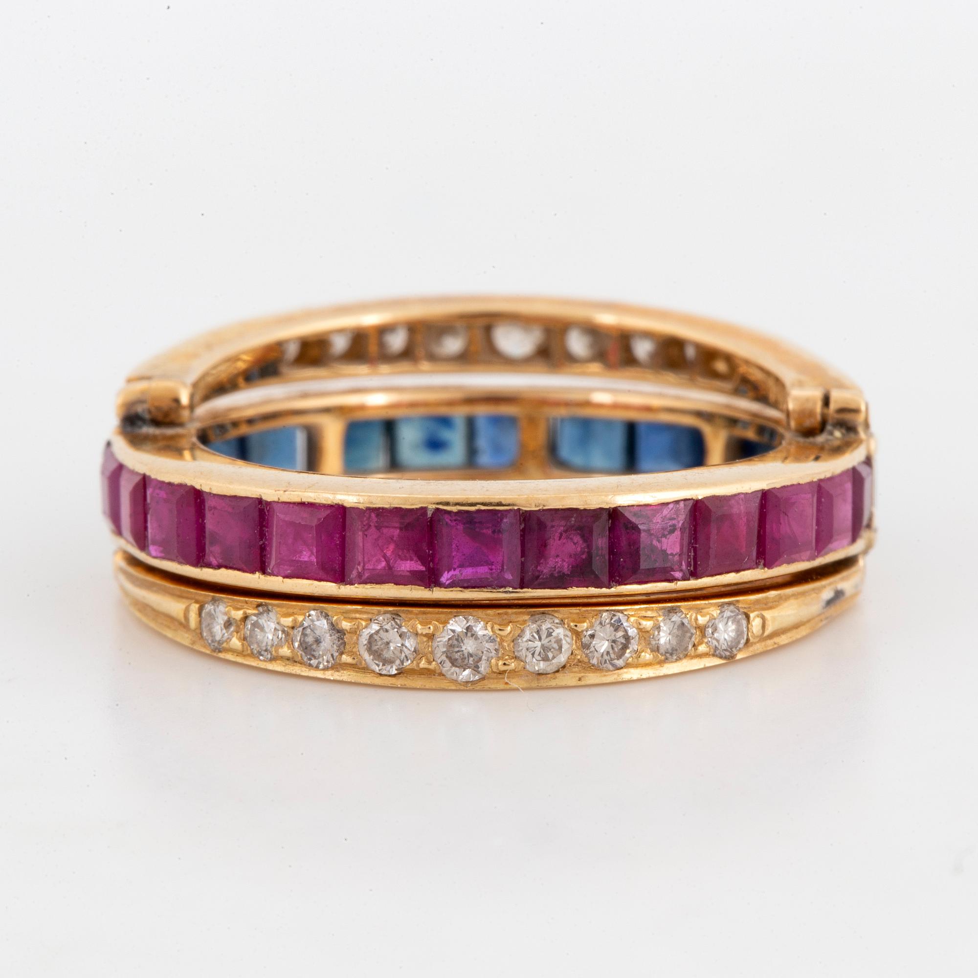 Calibre-cut ruby and sapphire and brillint-cut diamond ring.