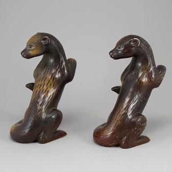 GUNNAR NYLUND, two otter stoneware figurines from Rörstrand.