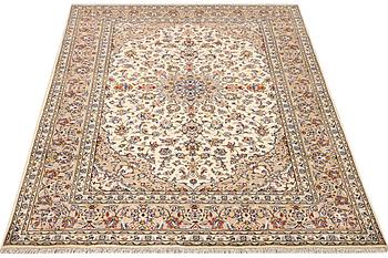 A Kashan carpet a. 285 x 190 cm.
