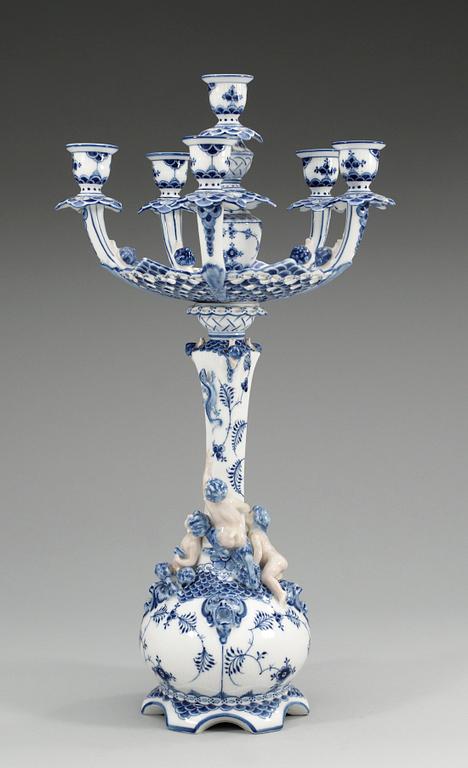 A Royal Copenhagen 'Musselmaalet' six light candelabra, 20th Century, model 1006.