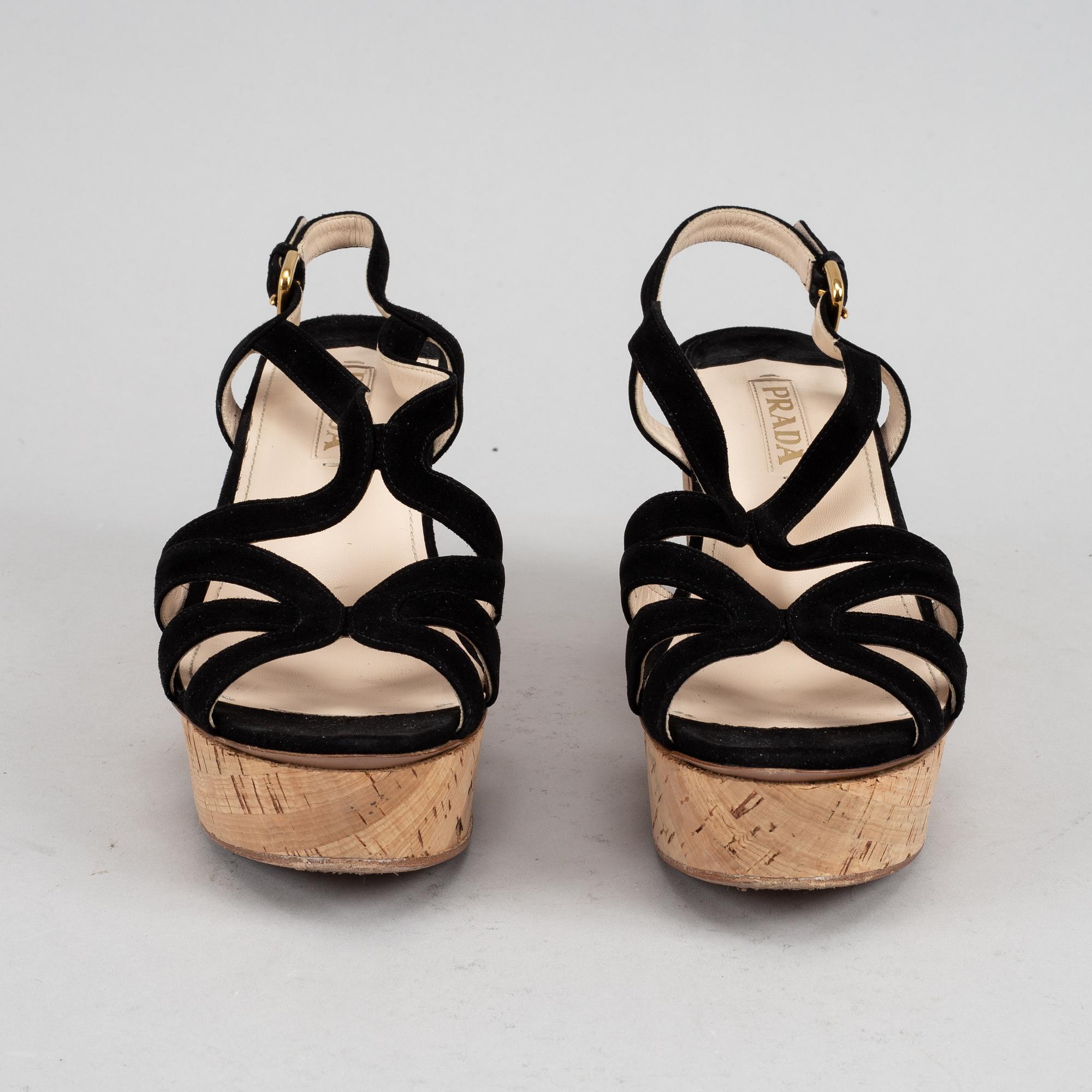 Prada, a pair of black suede wedge sandals, size 39½.