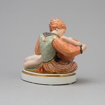 A Royal Copenhagen porcelain figure after Gerhard Hening, Denmark 1920's.